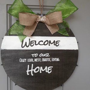 door sign welcome to messy chaotic living home